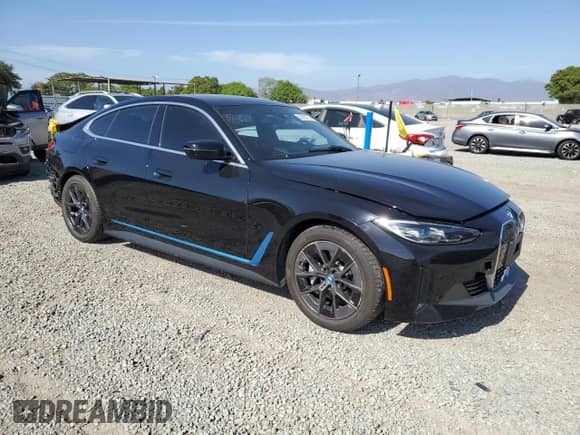2022 BMW i4 eDrive40 with VIN WBY73AW09NFN05752, listed as a Copart auction lot 58095875 with 43,401 mi miles and Salvage title. Bid and sale history available at DreamBid. Image 4.