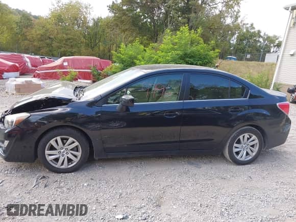 2016 Subaru Impreza Premium z VIN JF1GJAB60GH012508, wystawiony jako IAAI lot #43229796 z przebiegiem 97 497 mil mil oraz . Historia ofert i sprzedaży dostępna na DreamBid. Obrazek 14.