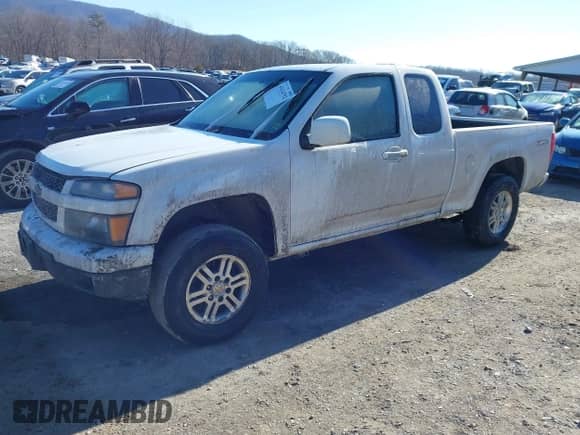 2012 Chevrolet Colorado 1LT z VIN 1GCJTCFE1C8160572, wystawiony jako IAAI lot #41634792 z przebiegiem Nie podano mil oraz . Historia ofert i sprzedaży dostępna na DreamBid. Obrazek 18.