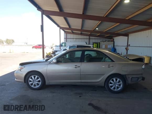 2002 Toyota Camry LE z VIN JTDBE32K320136619, wystawiony jako IAAI lot #42821050 z przebiegiem 165 174 mil mil oraz . Historia ofert i sprzedaży dostępna na DreamBid. Obrazek 15.