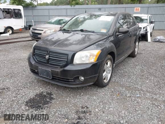 2009 Dodge Caliber SXT with VIN 1B3HB48A29D180283, listed as a IAAI auction lot 42875302 with 133,945 mi miles and . Bid and sale history available at DreamBid. Image 2.