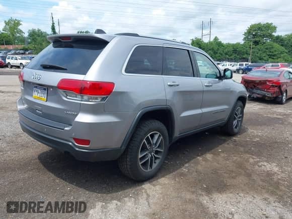 2019 Jeep Grand Cherokee Altitude with VIN 1C4RJFAG8KC724748, listed as a IAAI auction lot 42468245 with 68,705 mi miles and . Bid and sale history available at DreamBid. Image 4.