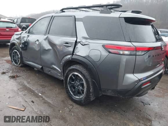 2023 Nissan Pathfinder Rock Creek with VIN 5N1DR3BD8PC275189, listed as a IAAI auction lot 41039839 with 50,058 mi miles and . Bid and sale history available at DreamBid. Image 3.