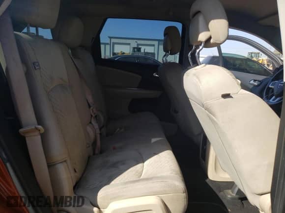 2013 Dodge Journey American Value с VIN 3C4PDCAB8DT647288, выставлен на аукционе Copart как лот 84297845 с пробегом 166 060 миль миль и Списание • Salvage title. История ставок и продаж доступна на DreamBid. Изображение 11.