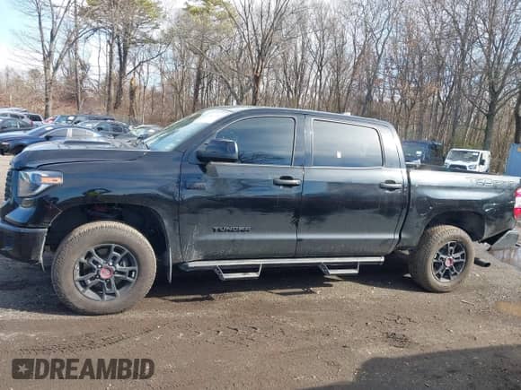 2021 Toyota Tundra SR5 with VIN 5TFDY5F10MX964425, listed as a IAAI auction lot 41843735 with 108,005 mi miles and . Bid and sale history available at DreamBid. Image 14.