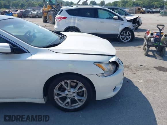 2014 Nissan Maxima SV z VIN 1N4AA5AP4EC443094, wystawiony jako IAAI lot #43183195 z przebiegiem 143 762 mil mil oraz . Historia ofert i sprzedaży dostępna na DreamBid. Obrazek 14.