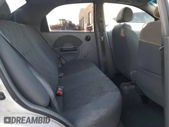 2005 Chevrolet Aveo LS z VIN KL1TD52665B331166, wystawiony jako Copart lot #79510054 z przebiegiem 165 471 mil mil oraz Szkoda całkowita • Salvage title. Historia ofert i sprzedaży dostępna na DreamBid. Obrazek 10.