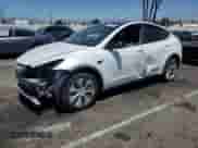 2023 Tesla Model Y Long Range with VIN 7SAYGDEEXPA039314, listed as a Copart auction lot 66657855 with 93,046 mi miles and Salvage title. Bid and sale history available at DreamBid. Image 1.