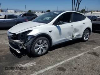 2023 Tesla Model Y Long Range with VIN 7SAYGDEEXPA039314, listed as a Copart auction lot 66657855 with 93,046 mi miles and Salvage title. Bid and sale history available at DreamBid. Image 1.
