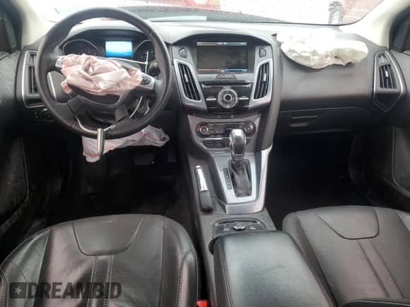 2014 Ford Focus Titanium z VIN 1FADP3N21EL192484, wystawiony jako Copart lot #86443235 z przebiegiem 162 638 mil mil oraz Nie do naprawy • Non repairable. Historia ofert i sprzedaży dostępna na DreamBid. Obrazek 8.