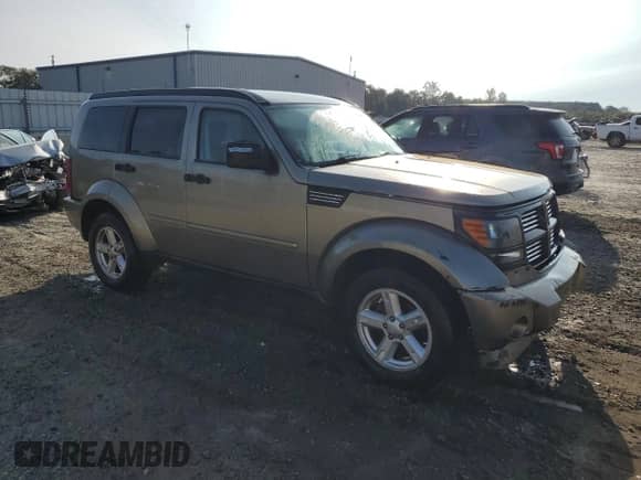 2007 Dodge Nitro SLT with VIN 1D8GU58K57W555363, listed as a Copart auction lot 70507764 with 192,067 mi miles and Salvage title. Bid and sale history available at DreamBid. Image 4.