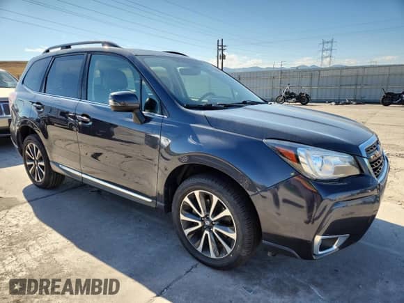 2017 Subaru Forester Touring z VIN JF2SJGWC1HH551911, wystawiony jako Copart lot #84236215 z przebiegiem 59 041 mil mil oraz Czysty tytuł • Clean title. Historia ofert i sprzedaży dostępna na DreamBid. Obrazek 4.
