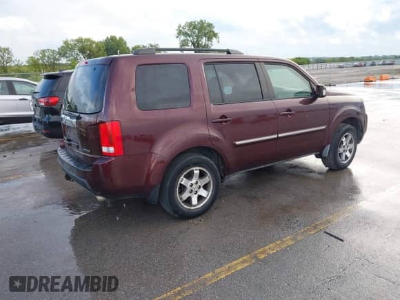 2009 Honda Pilot Touring with VIN 5FNYF38819B022195, listed as a IAAI auction lot 42850497 with 192,072 mi miles and . Bid and sale history available at DreamBid. Image 4.