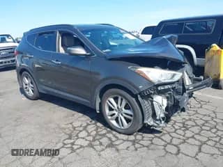 2014 Hyundai Santa Fe with VIN 5XYZUDLA9EG221654, listed as a IAAI auction lot 42605293 with 168,145 mi miles and . Bid and sale history available at DreamBid. Image 1.