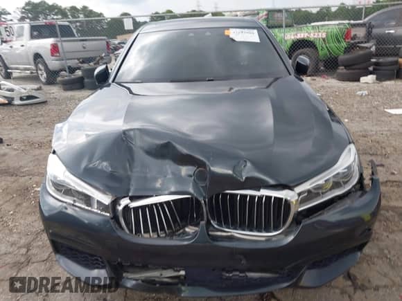 2017 BMW 7 Series ALPINA B7 xDrive with VIN WBA7F2C3XHG423053, listed as a IAAI auction lot 42645980 with 59,200 mi miles and . Bid and sale history available at DreamBid. Image 12.