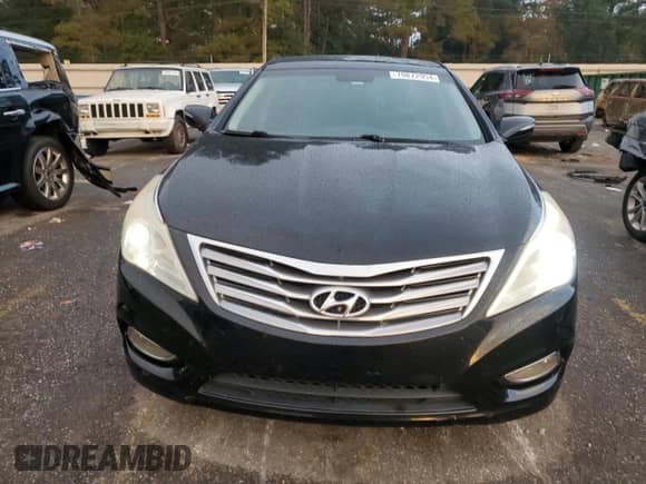 2013 Hyundai Azera с VIN KMHFH4JG8DA277190, выставлен на аукционе Copart как лот 79872954 с пробегом 222 832 миль миль и Списание • Salvage title. История ставок и продаж доступна на DreamBid. Изображение 5.