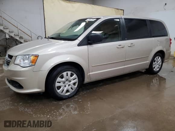 2014 Dodge Grand Caravan American Value with VIN 2C4RDGBG5ER119531, listed as a Copart auction lot 71867295 with 207,119 mi miles and Clean title. Bid and sale history available at DreamBid. Image 1.