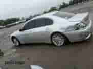 2004 BMW 7 Series 745i with VIN WBAGL634X4DP70421, listed as a Copart auction lot 73309744 with 123,457 mi miles and Salvage title. Bid and sale history available at DreamBid. Image 2.