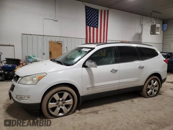 2009 Chevrolet Traverse LTZ with VIN 1GNEV33DX9S109405, listed as a Copart auction lot 84561344 with 171,791 mi miles and Salvage title. Bid and sale history available at DreamBid. Image 1.