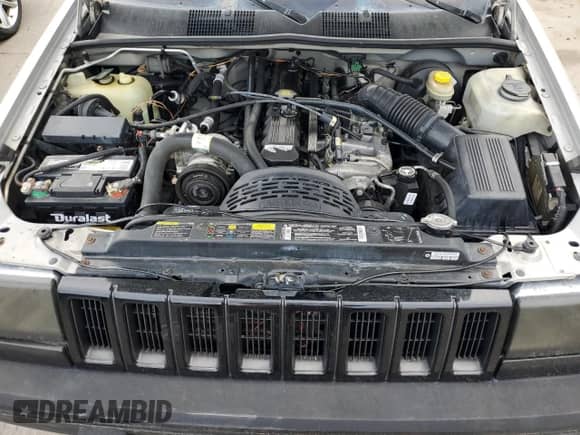 1995 Jeep Grand Cherokee Laredo with VIN 1J4GZ58S2SC703196, listed as a Copart auction lot 68571944 with 264,876 mi miles and Clean title. Bid and sale history available at DreamBid. Image 12.