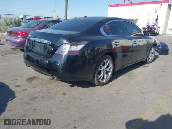 2013 Nissan Maxima S with VIN 1N4AA5AP9DC821411, listed as a IAAI auction lot 42598453 with 127,088 mi miles and . Bid and sale history available at DreamBid. Image 4.