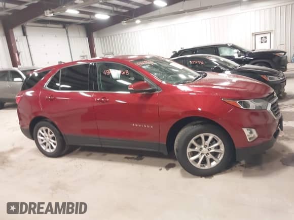 2019 Chevrolet Equinox LT z VIN 3GNAXTEV1KS593389, wystawiony jako IAAI lot #43478768 z przebiegiem 74 851 mil mil oraz . Historia ofert i sprzedaży dostępna na DreamBid. Obrazek 13.