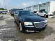 2014 Chrysler 300 C John Varvatos Luxury Edition с VIN 2C3CCADG9EH180913, выставлен на аукционе Copart как лот 62553235 с пробегом 189 610 миль миль и Списание • Salvage title. История ставок и продаж доступна на DreamBid. Изображение 14.