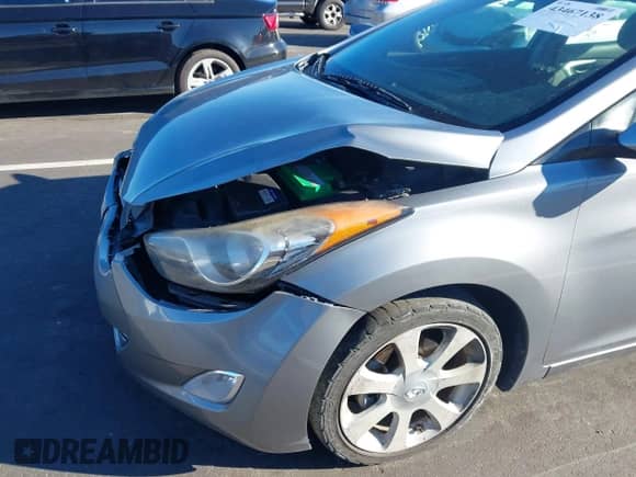 2013 Hyundai Elantra GLS z VIN KMHDH4AEXDU578323, wystawiony jako IAAI lot #43467138 z przebiegiem 153 123 mil mil oraz . Historia ofert i sprzedaży dostępna na DreamBid. Obrazek 13.