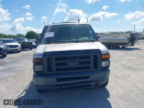 2014 Ford Econoline Cargo Commercial with VIN 1FTNE1EW4EDB05697, listed as a IAAI auction lot 42899014 with 216,329 mi miles and . Bid and sale history available at DreamBid. Image 12.
