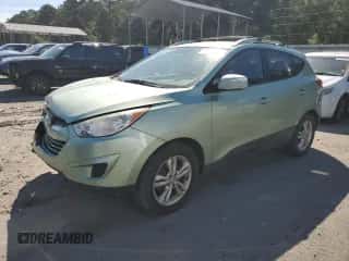 2012 Hyundai Tucson GLS z VIN KM8JU3AC7CU326017, wystawiony jako Copart lot #71749405 z przebiegiem 279 791 mil mil oraz Szkoda całkowita • Salvage title. Historia ofert i sprzedaży dostępna na DreamBid. Obrazek 1.