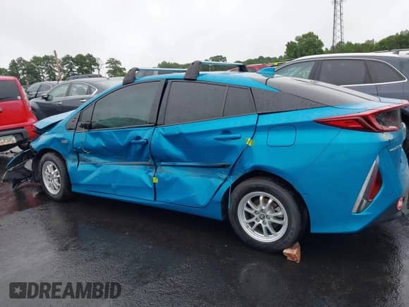 2018 Toyota Prius Plus z VIN JTDKARFP7J3070223, wystawiony jako IAAI lot #42922283 z przebiegiem 65 134 mil mil oraz . Historia ofert i sprzedaży dostępna na DreamBid. Obrazek 14.