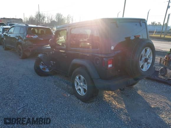 2020 Jeep Wrangler Sport S with VIN 1C4GJXAGXLW228489, listed as a IAAI auction lot 41263174 with 61,400 mi miles and . Bid and sale history available at DreamBid. Image 3.
