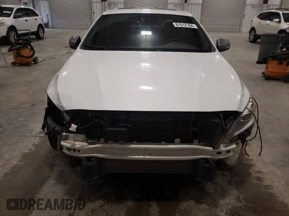 2015 Volvo S60 T6 R-Design Platinum с VIN YV1902TS3F1335329, выставлен на аукционе Copart как лот 81512184 с пробегом 103 129 миль миль и Списание • Salvage title. История ставок и продаж доступна на DreamBid. Изображение 5.