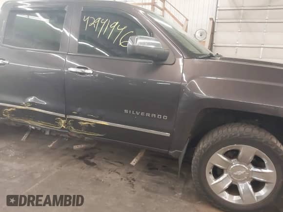 2014 Chevrolet Silverado 1500 LTZ z VIN 3GCUKSEJ5EG296189, wystawiony jako IAAI lot #42941946 z przebiegiem 196 524 mil mil oraz . Historia ofert i sprzedaży dostępna na DreamBid. Obrazek 6.