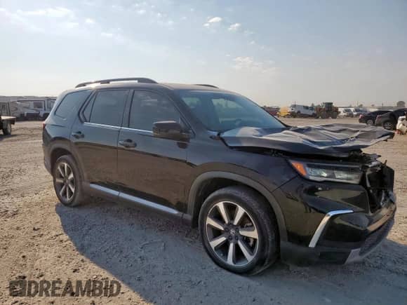 2023 Honda Pilot Elite z VIN 5FNYG1H84PB012565, wystawiony jako Copart lot #85123815 z przebiegiem 71 170 mil mil oraz Szkoda całkowita • Salvage title. Historia ofert i sprzedaży dostępna na DreamBid. Obrazek 4.