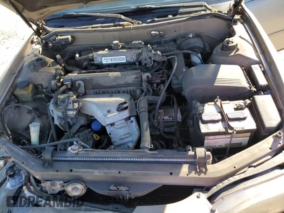 1995 Toyota Camry DX z VIN 4T1SK11E0SU634144, wystawiony jako Copart lot #77469074 z przebiegiem 123 359 mil mil oraz Czysty tytuł • Clean title. Historia ofert i sprzedaży dostępna na DreamBid. Obrazek 11.