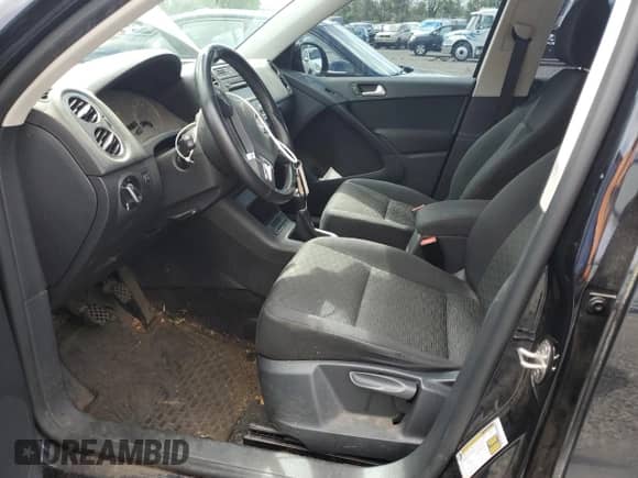 2014 Volkswagen Tiguan с VIN WVGCV3AX8EW609459, выставлен на аукционе Copart как лот 57623305 с пробегом 106 158 миль миль и Списание • Salvage title. История ставок и продаж доступна на DreamBid. Изображение 7.