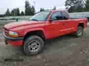 1998 Dodge Dakota SLT with VIN 1B7GG22Y8WS558264, listed as a Copart auction lot 67648335 with 144,617 mi miles and Salvage title. Bid and sale history available at DreamBid. Image 1.