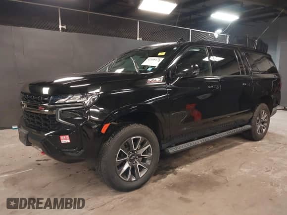 2021 Chevrolet Suburban Z71 with VIN 1GNSKDKD3MR140935, listed as a IAAI auction lot 42345178 with 52,370 mi miles and . Bid and sale history available at DreamBid. Image 18.