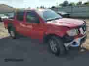 2009 Nissan Frontier SE with VIN 1N6AD07W59C425693, listed as a Copart auction lot 69923245 with 124,476 mi miles and Salvage title. Bid and sale history available at DreamBid. Image 4.