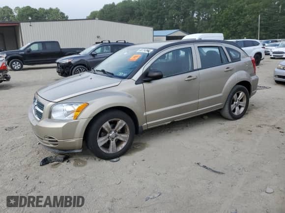 2010 Dodge Caliber SXT with VIN 1B3CB4HAXAD540088, listed as a Copart auction lot 68734845 with 153,998 mi miles and Salvage title. Bid and sale history available at DreamBid. Image 1.
