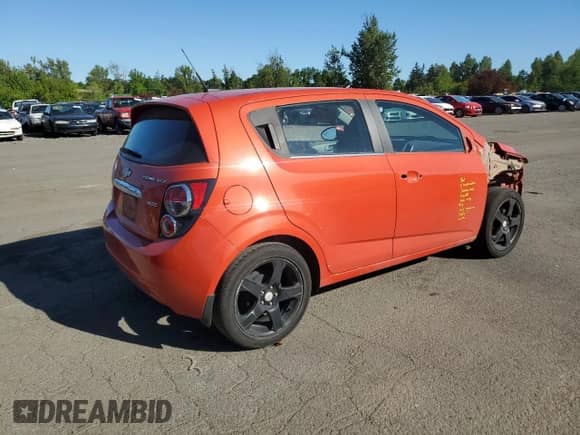 2013 Chevrolet Sonic LTZ with VIN 1G1JE6SB7D4133482, listed as a Copart auction lot 53972434 with 71,775 mi miles and Salvage title. Bid and sale history available at DreamBid. Image 3.