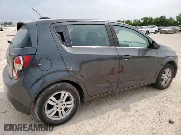 2016 Chevrolet Sonic LT с VIN 1G1JC6SH2G4156022, выставлен на аукционе Copart как лот 67184345 с пробегом 88 302 миль миль и Списание • Salvage title. История ставок и продаж доступна на DreamBid. Изображение 3.