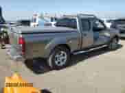 2004 Nissan Frontier XE z VIN 1N6ED29X64C430767, wystawiony jako Copart lot #62191075 z przebiegiem 110 110 mil mil oraz Szkoda całkowita • Salvage title. Historia ofert i sprzedaży dostępna na DreamBid. Obrazek 3.