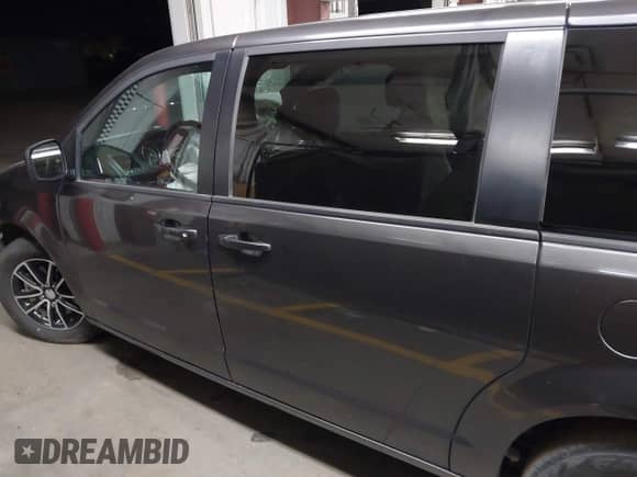 2018 Dodge Grand Caravan SE with VIN 2C4RDGBG8JR303954, listed as a IAAI auction lot 42385878 with 70,320 mi miles and . Bid and sale history available at DreamBid. Image 15.