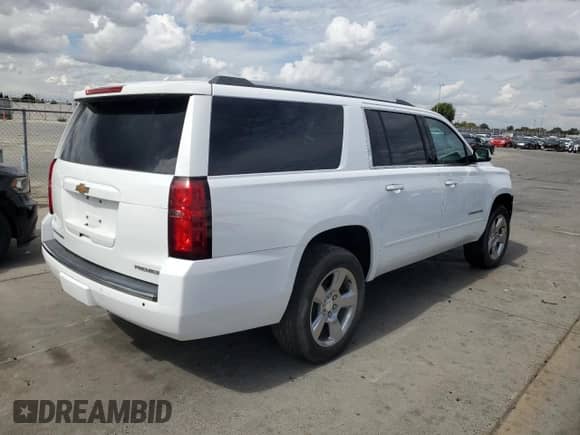 2019 Chevrolet Suburban Premier с VIN 1GNSKJKCXKR149313, выставлен на аукционе Copart как лот 84795425 с пробегом 18 526 миль миль и На запчасти • Non repairable. История ставок и продаж доступна на DreamBid. Изображение 3.