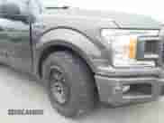 2018 Ford F-150 XL with VIN 1FTEW1CPXJKF05181, listed as a IAAI auction lot 42433178 with 97,101 mi miles and . Bid and sale history available at DreamBid. Image 6.