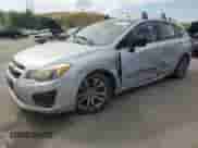 2014 Subaru Impreza 2.0i with VIN JF1GPAA67E9308391, listed as a Copart auction lot 67928295 with 97,396 mi miles and Salvage title. Bid and sale history available at DreamBid. Image 1.