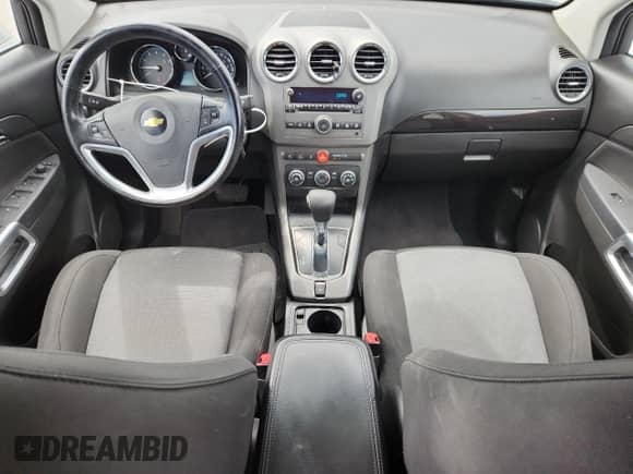 2013 Chevrolet Captiva Sport LS z VIN 3GNAL2EK4DS575807, wystawiony jako Copart lot #70582025 z przebiegiem 113 236 mil mil oraz Szkoda całkowita • Salvage title. Historia ofert i sprzedaży dostępna na DreamBid. Obrazek 8.