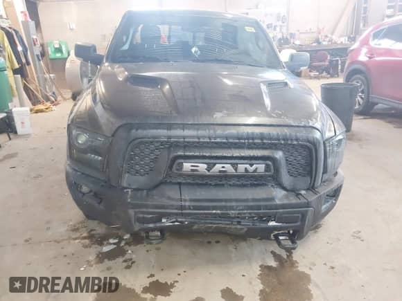 2018 Ram 1500 Rebel with VIN 1C6RR7YT1JS234777, listed as a IAAI auction lot 41409525 with 119,497 mi miles and . Bid and sale history available at DreamBid. Image 6.